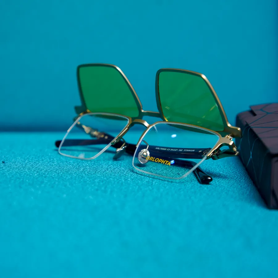 Monture ORLOPHTA dorée à verres solaires verts